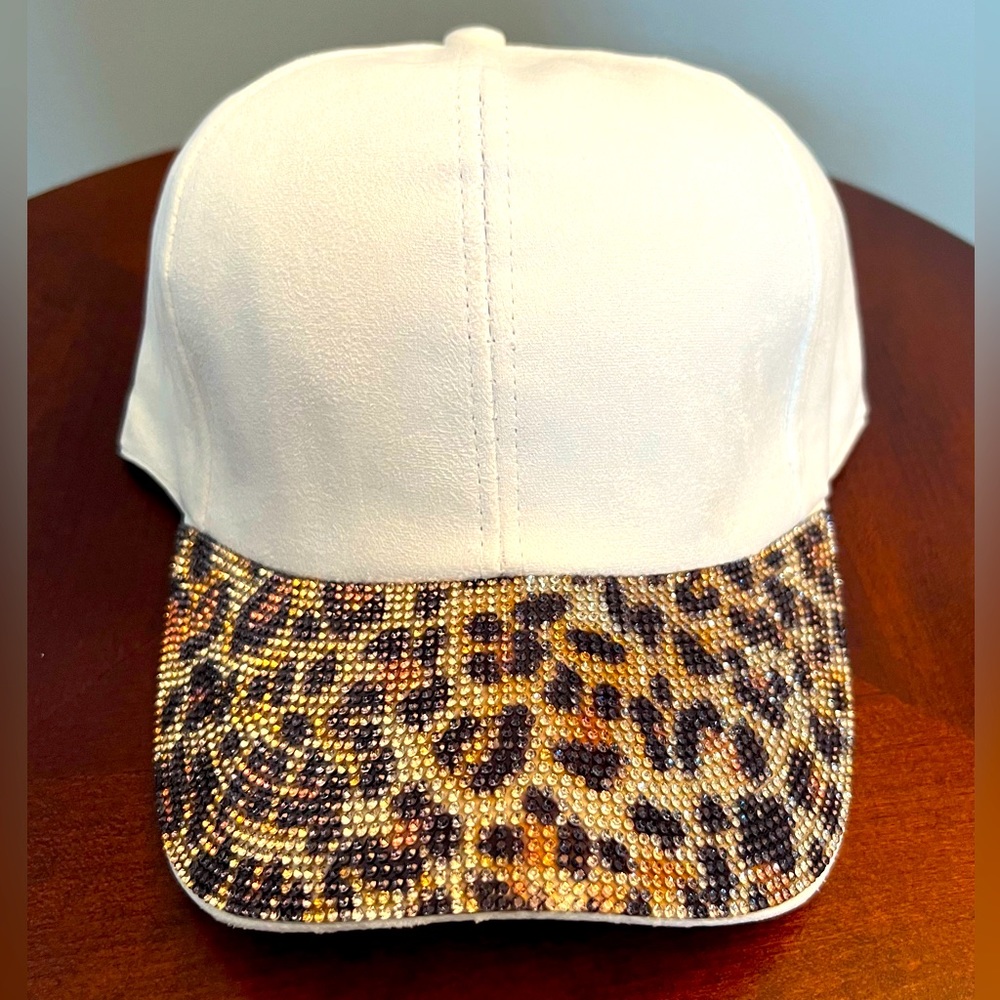 Sale!! Gorgeous studded white with animal print cap —